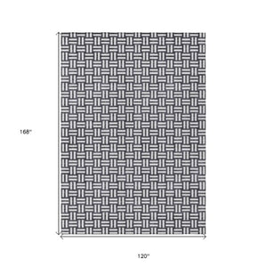 Homeroots 3' Black And Ivory Geometric Indoor Outdoor Area Rug - Stylish, Washable, Durable For Any Space 10' X 14' Polyester 595528
