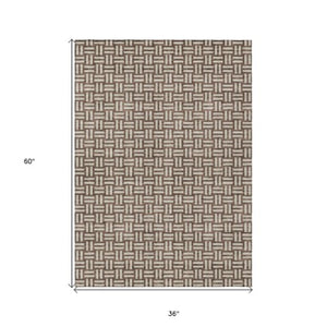 Homeroots 3' Black And Ivory Geometric Indoor Outdoor Area Rug - Stylish, Washable, Durable For Any Space 3' X 5' Polyester 595529