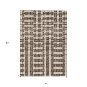 Homeroots 3' Black And Ivory Geometric Indoor Outdoor Area Rug - Stylish, Washable, Durable For Any Space 5' X 8' Polyester 595530