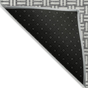 Homeroots 3' Black And Ivory Geometric Indoor Outdoor Area Rug - Stylish, Washable, Durable For Any Space 3' X 5' Polyester 595559