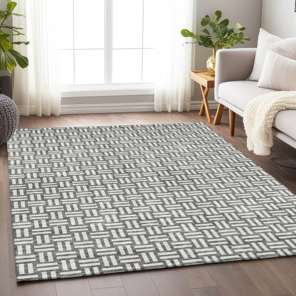 Homeroots 3' Black And Ivory Geometric Indoor Outdoor Area Rug - Stylish, Washable, Durable For Any Space 9' X 12' Polyester 595563