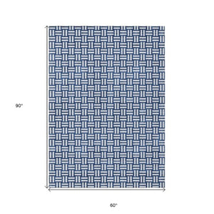 Homeroots 3' Black And Ivory Geometric Indoor Outdoor Area Rug - Stylish, Washable, Durable For Any Space 5' X 8' Polyester 595572