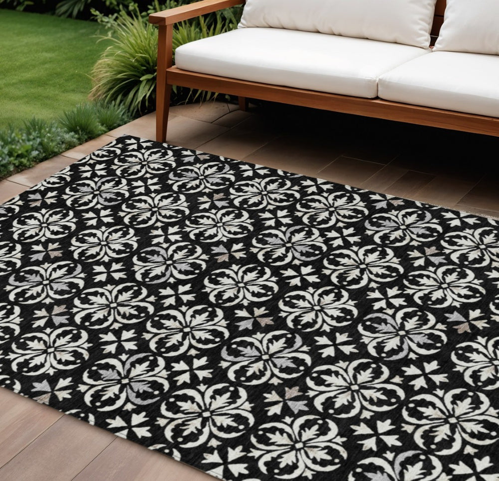 HomeRoots 5' Elegant Black and Ivory Floral Area Rug - Durable, Washable Design for Indoor and Outdoor Use 10' X 14' 595930