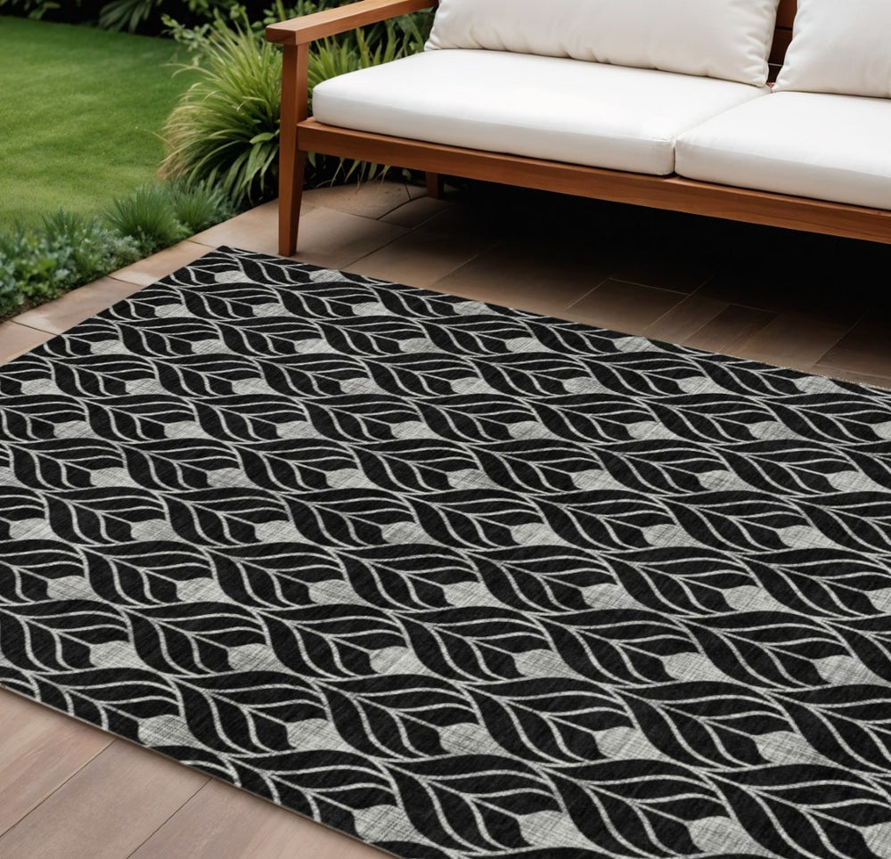 HomeRoots 9' X 12' Stylish Black & Ivory Geometric Washable Area Rug for Indoor/Outdoor High-Traffic Spaces 596007