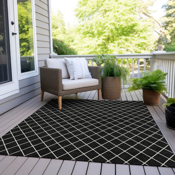 HomeRoots 9' X 12' Stylish Black and Ivory Geometric Indoor Outdoor Rug - Durable, Washable & Versatile Design 596085