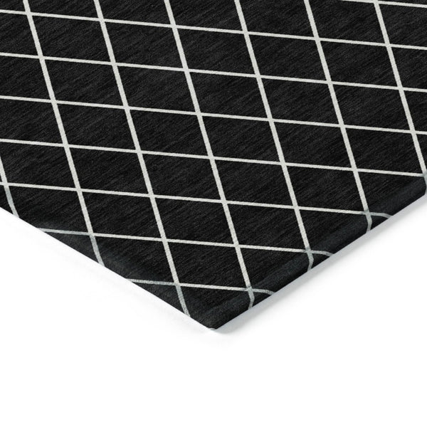 HomeRoots 9' X 12' Stylish Black and Ivory Geometric Indoor Outdoor Rug - Durable, Washable & Versatile Design 596085