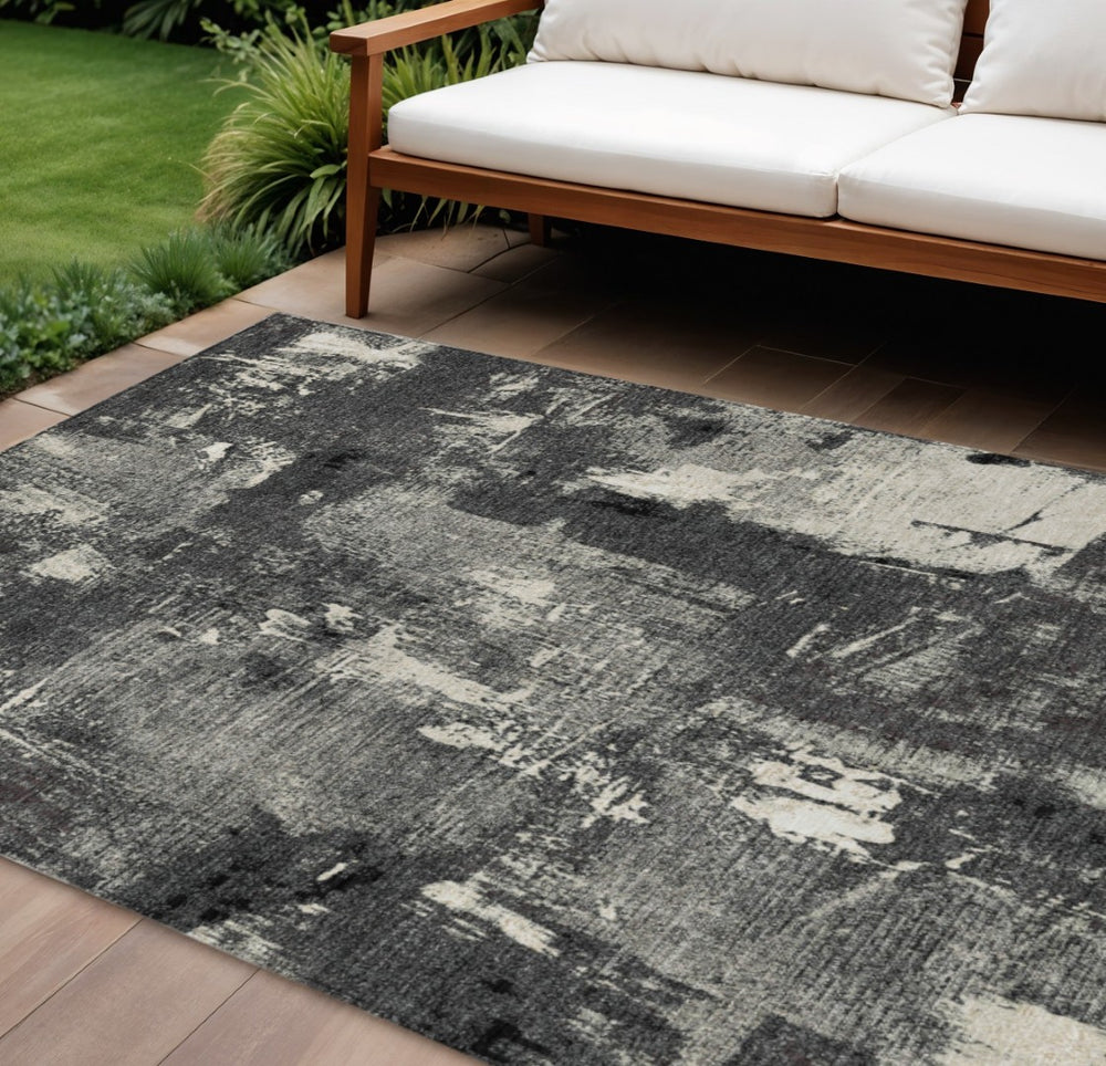 HomeRoots 5' Modern Abstract Washable Area Rug in Black, Gray, and Ivory for Indoor and Outdoor Spaces 8' X 10' 596845