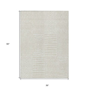 Homeroots 3' Beige And Ivory Geometric Washable Area Rug - Versatile Indoor Outdoor Design For Any Space 3' X 5' Polyester 596938