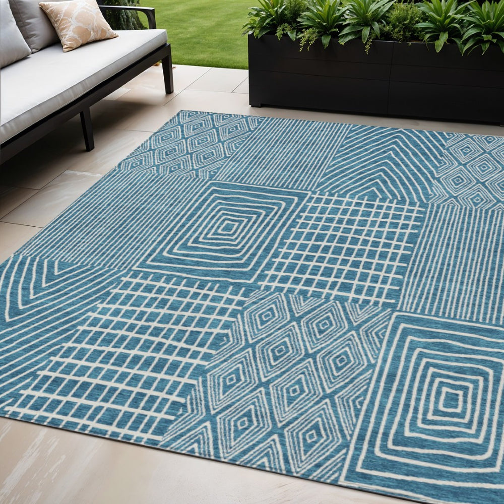 HomeRoots 5' Teal Blue and Ivory Geometric Indoor-Outdoor Area Rug for Modern Spaces – Stain-Resistant Design 5' X 8' 596975