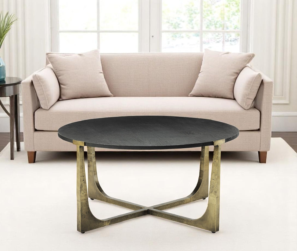 Homeroots 34" Antiqued Gold Round Coffee Table – Solid Wood & Iron, Distressed Vintage Chic Design For Any Space   597057