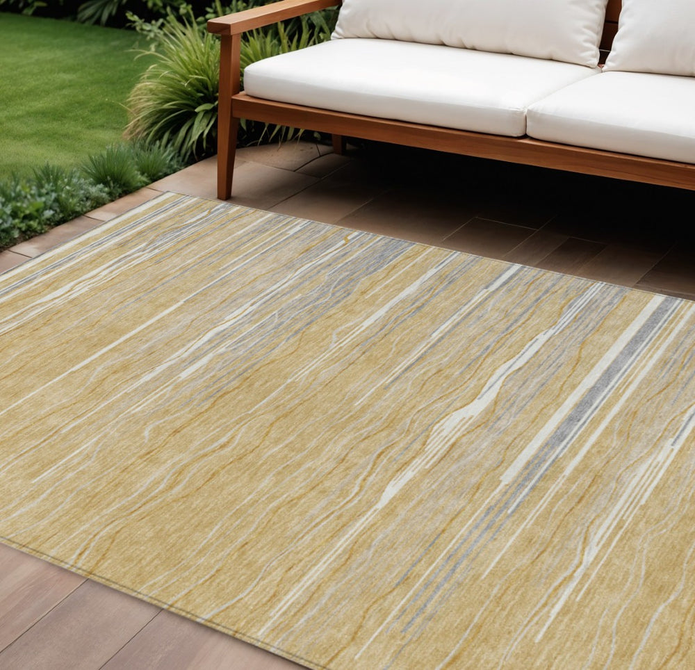 HomeRoots 5' Stylish Gold Gray and Ivory Striped Washable Area Rug for Indoor and Outdoor Elegance 10' X 14' 597246