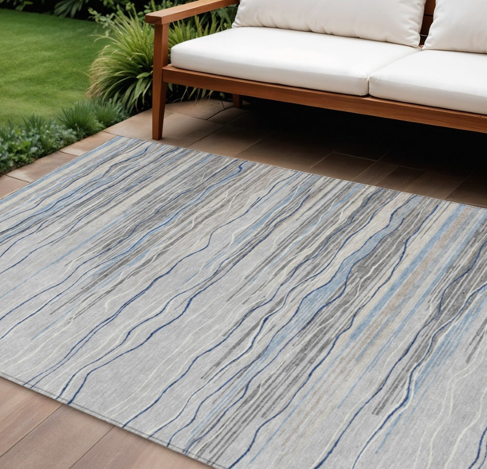 HomeRoots 9' X 12' Stylish Gray Silver and Blue Striped Washable Area Rug for Indoor and Outdoor Spaces 597251