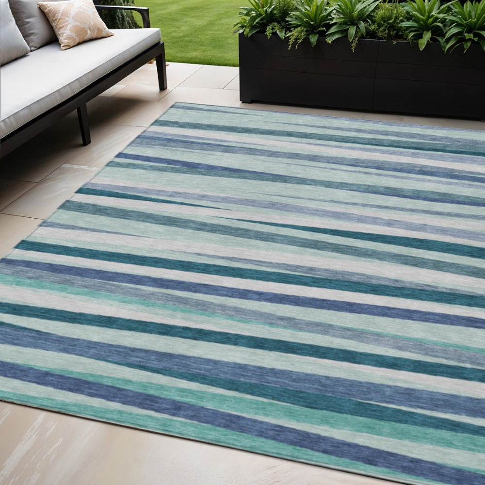 HomeRoots 5' Striped Washable Area Rug in Teal Blue Gray Ivory - Durable for Indoor & Outdoor Living Spaces 5' X 8' 597362