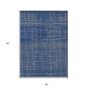 Homeroots 3' Black Ivory And Brown Striped Washable Area Rug For Indoor And Outdoor Spaces, Durable & Stylish 5' X 8' Polyester 597410