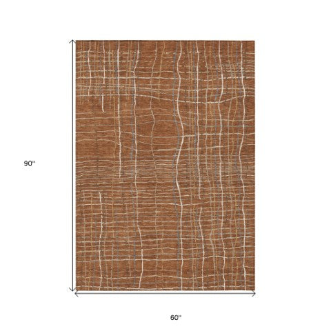 Homeroots 3' Black Ivory And Brown Striped Washable Area Rug For Indoor And Outdoor Spaces, Durable & Stylish 5' X 8' Polyester 597422