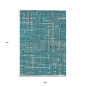 Homeroots 3' Black Ivory And Brown Striped Washable Area Rug For Indoor And Outdoor Spaces, Durable & Stylish 5' X 8' Polyester 597434