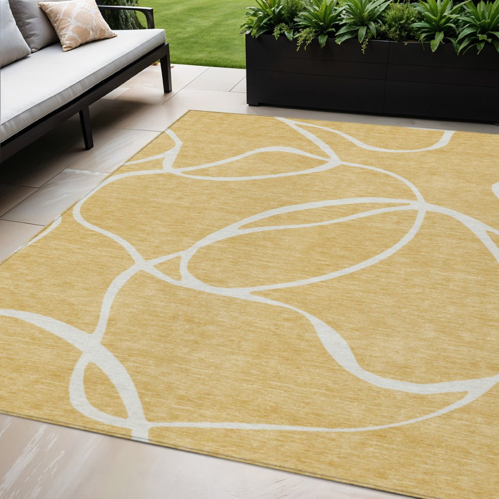 HomeRoots 5' Gold and Ivory Abstract Area Rug – Stylish, Washable, Durable Indoor/Outdoor Solution for Any Space 5' X 8' 597476