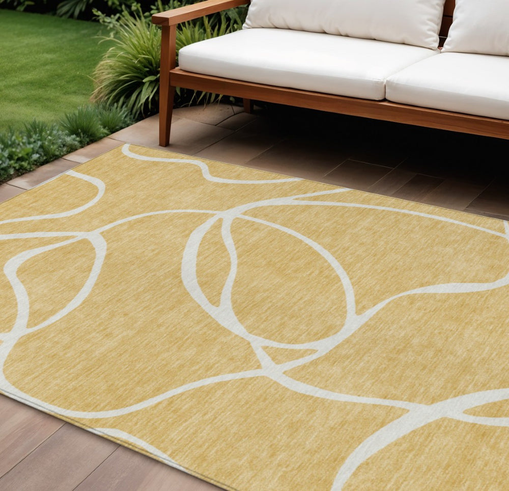 HomeRoots 9' X 12' Stylish Gold and Ivory Abstract Washable Area Rug for Indoor and Outdoor Durability 597479