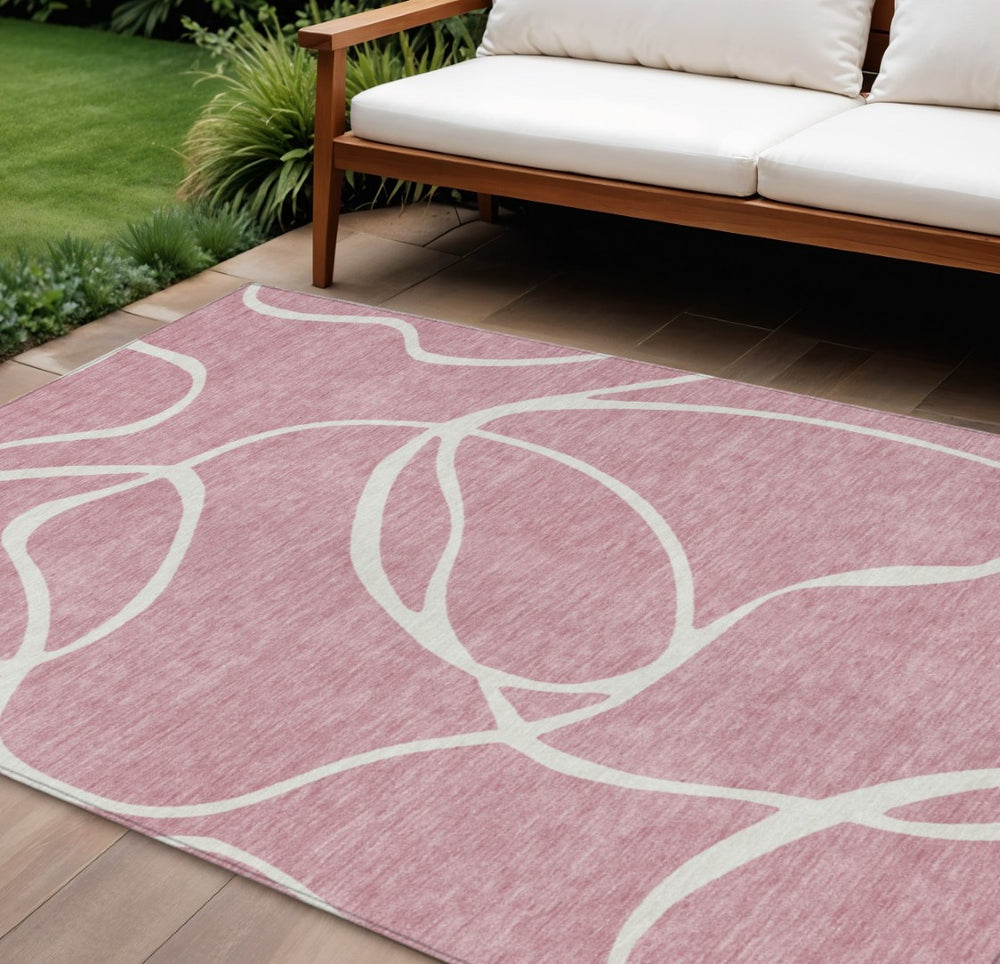 HomeRoots 9' X 12' Pink and Ivory Abstract Washable Area Rug - Durable Indoor/Outdoor Elegance for Modern Spaces 597503