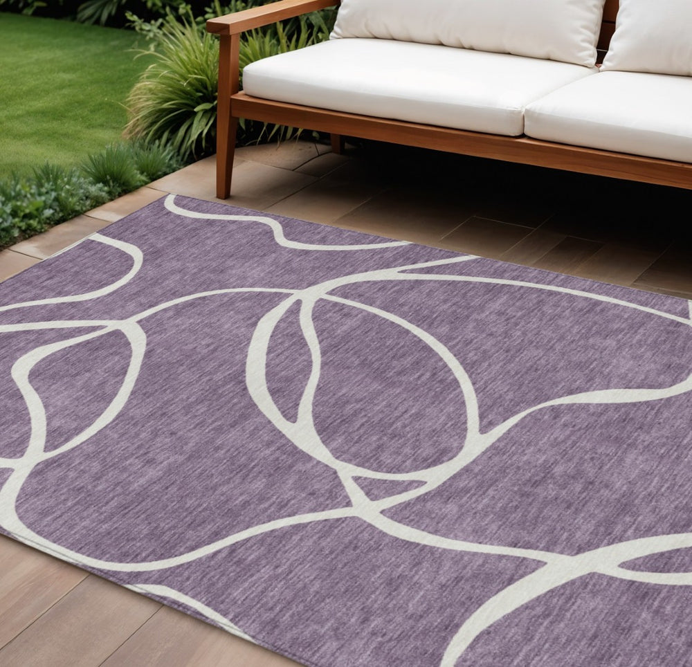 HomeRoots 9' X 12' Stylish Purple and Ivory Abstract Washable Area Rug for Indoor/Outdoor High-Traffic Use 597515