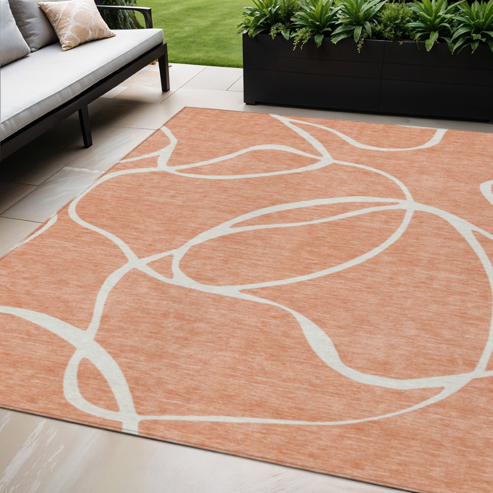 HomeRoots 5' Salmon and Ivory Abstract Indoor Outdoor Area Rug – Durable, Stylish, and Machine Washable Design 5' X 8' 597518
