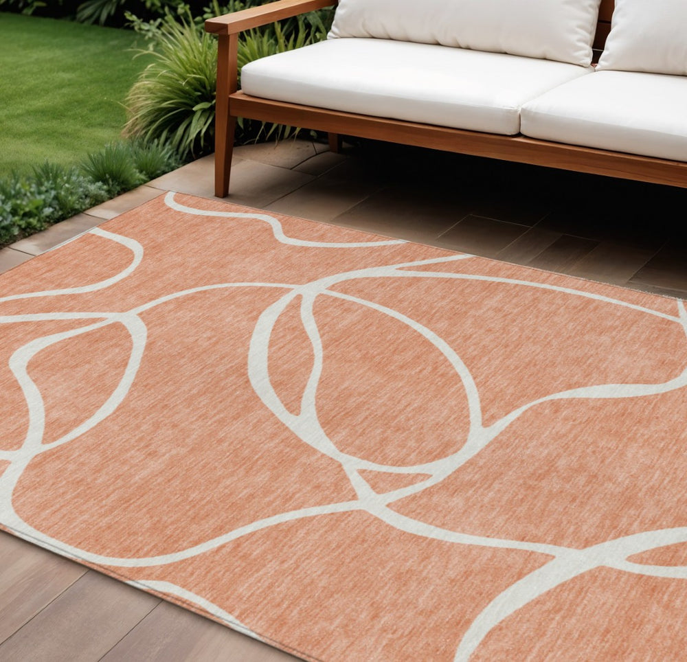 HomeRoots 9' X 12' Salmon and Ivory Abstract Area Rug - Washable, Versatile Design for Indoor & Outdoor Spaces 597521