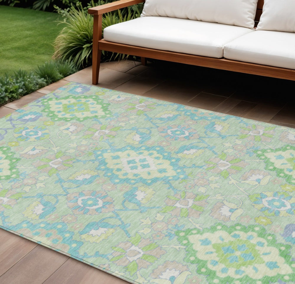 HomeRoots 9' X 12' Mint Green Blue Ivory Oriental Washable Area Rug - Durable, Stylish for Indoor & Outdoor Use 597702