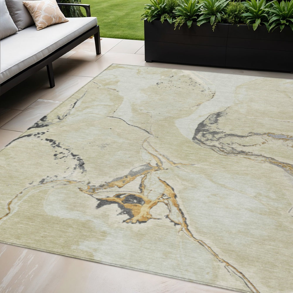 HomeRoots 5' Stylish Ivory Gray and Gold Abstract Washable Area Rug for Indoor and Outdoor Spaces, Durable Design 5' X 8' 597777