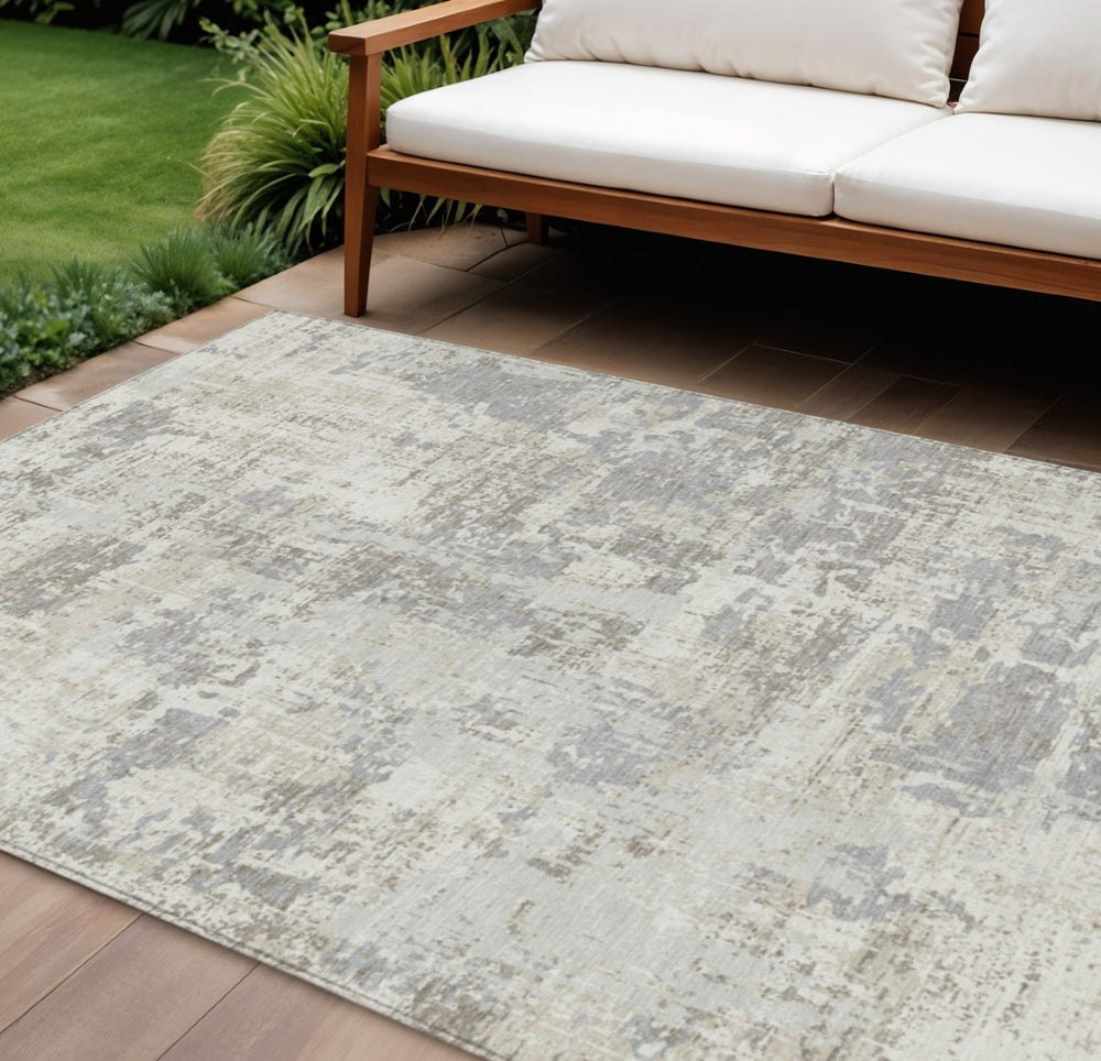 HomeRoots 9' X 12' Ivory and Gray Abstract Washable Area Rug – Durable, Stylish, Perfect for Indoor & Outdoor Use! 597978