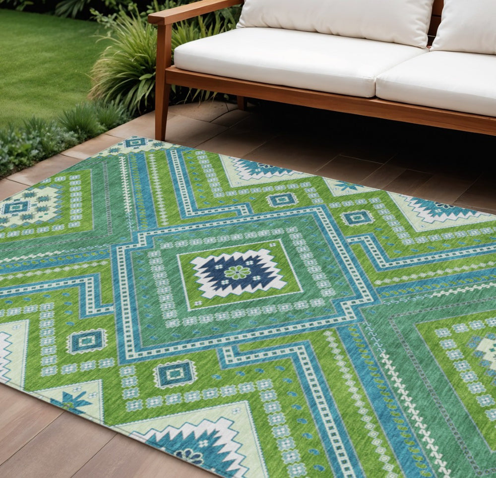 HomeRoots 5' Vibrant Lime Green Aqua Ivory Tribal Area Rug - Washable, Durable, Indoor/Outdoor Accent Piece 10' X 14' 598135