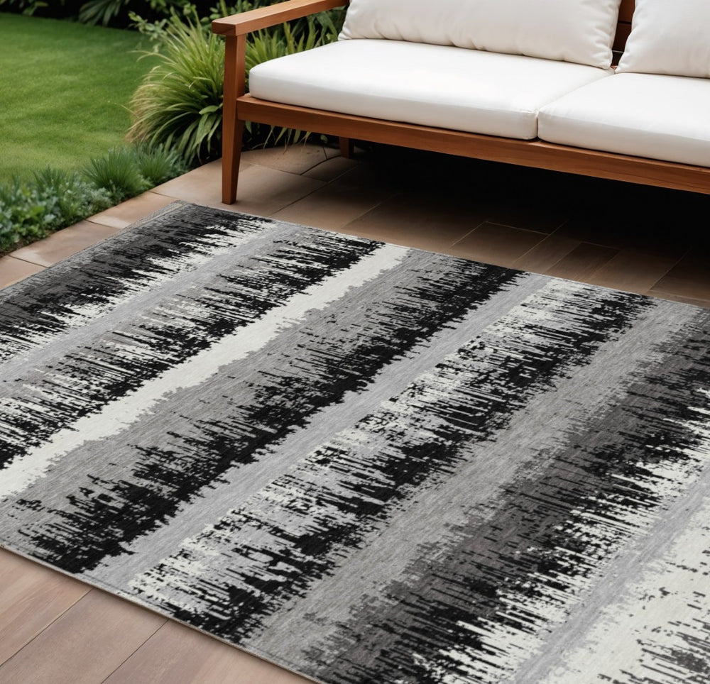 HomeRoots 9' X 12' Stylish Black Gray Ivory Striped Washable Area Rug - Durable, Versatile for Indoor & Outdoor Use 598320