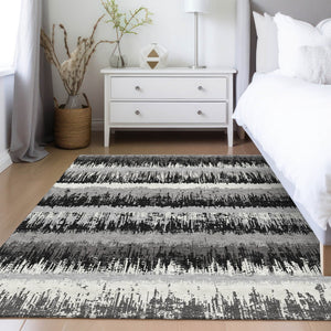 HomeRoots 5' Elegant Black, Gray & Ivory Striped Washable Indoor-Outdoor Area Rug for Stylish Spaces 10' X 14' 598321