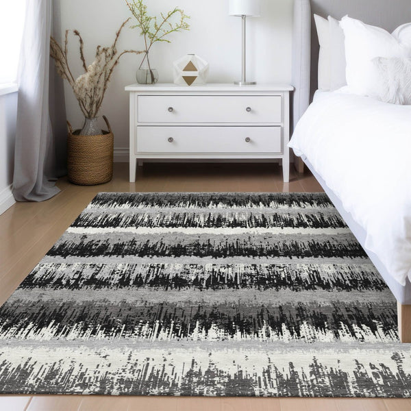 HomeRoots 5' Elegant Black, Gray & Ivory Striped Washable Indoor-Outdoor Area Rug for Stylish Spaces 10' X 14' 598321