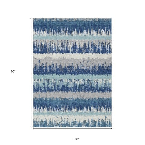 Homeroots 3' Striped Artichoke Green Beige Ivory Washable Area Rug For Indoor Outdoor Spaces, Durable Design 5' X 8' Polyester 598329