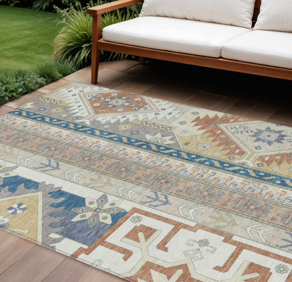 HomeRoots 9' X 12' Durable Aztec Indoor Outdoor Area Rug in Ivory, Blue & Brown - Stylish & Washable Design! 598470
