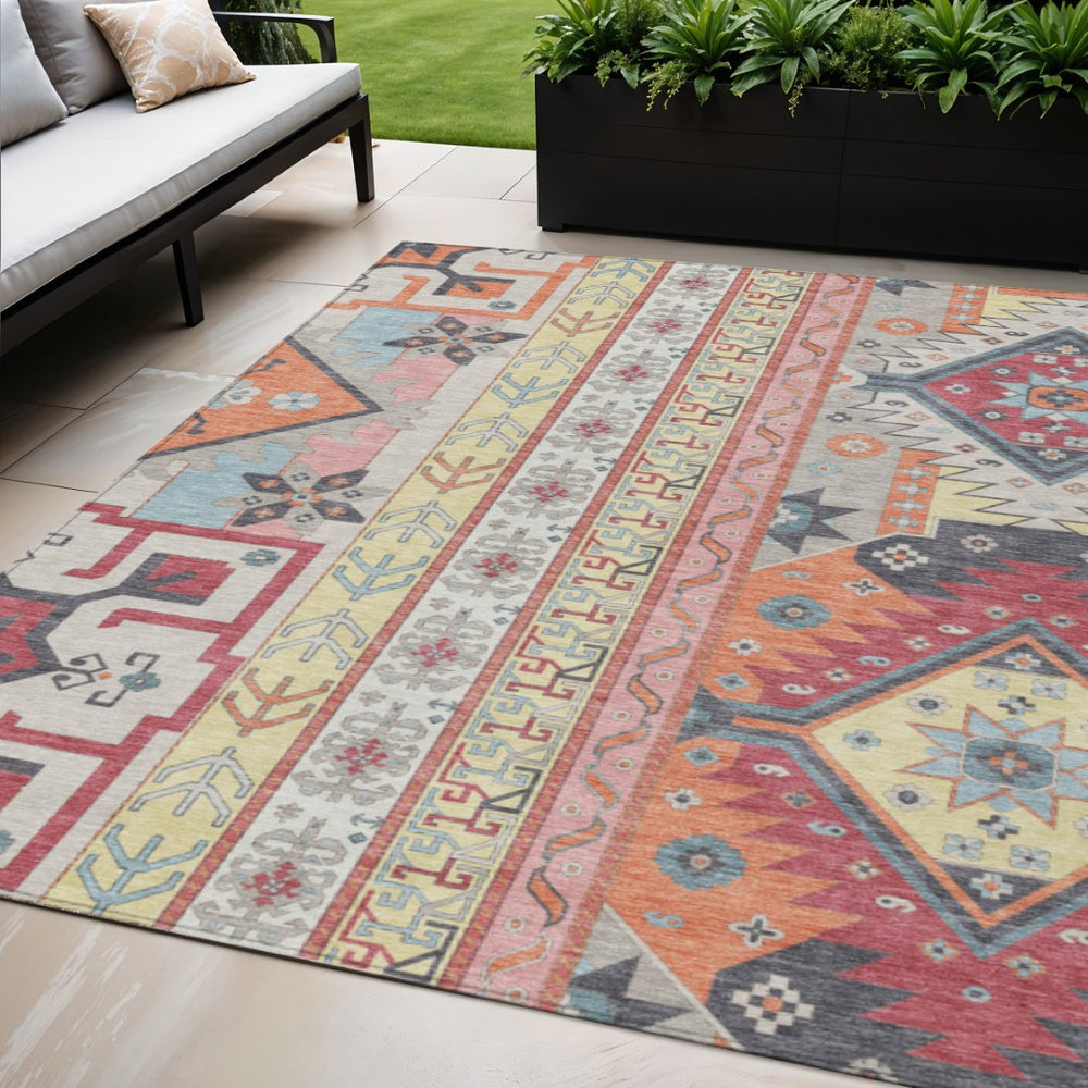 HomeRoots 5' Durable Pink and Yellow Aztec Area Rug – Stylish Washable Design for Indoor and Outdoor Use 5' X 8' 598473