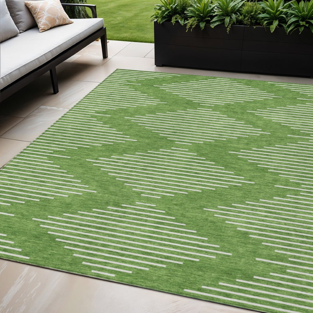 HomeRoots 5' Geometric Green and Ivory Washable Area Rug for Indoor and Outdoor Spaces - Stain Resistant Design 5' X 8' 598563