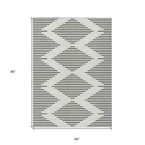 Homeroots 3' Beige And Ivory Geometric Washable Area Rug - Perfect For Indoor And Outdoor Spaces, Durable Design 5' X 8' Polyester 598581