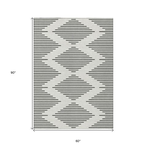 Homeroots 3' Beige And Ivory Geometric Washable Area Rug - Perfect For Indoor And Outdoor Spaces, Durable Design 5' X 8' Polyester 598581