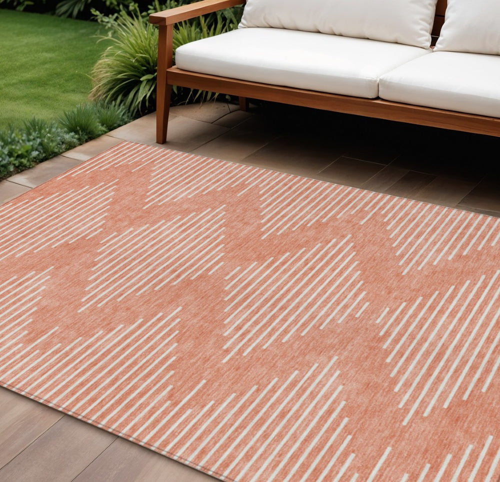 HomeRoots 5' Salmon and Ivory Geometric Indoor Outdoor Area Rug – Stylish, Durable, and Washable Design Perfect for Any Space 10' X 14' 598621