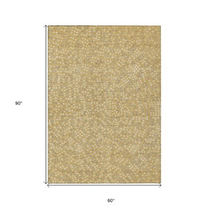 Homeroots 3' Stylish Brown Gold And Ivory Polka Dot Washable Area Rug For Indoor And Outdoor Spaces 5' X 8' Polyester 599041