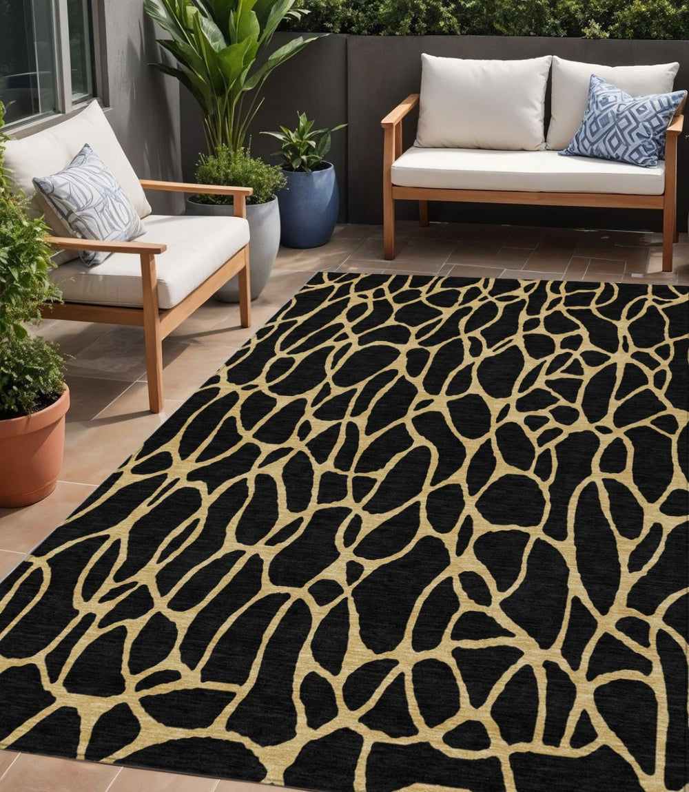 HomeRoots 5' Black and Gold Geometric Area Rug - Durable, Washable, Non-Slip Design for Indoor and Outdoor Use 5' X 8' 599179