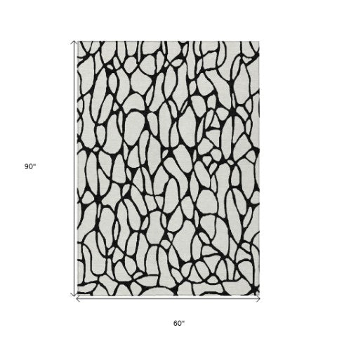 Homeroots 3' Beige And Blue Geometric Indoor Outdoor Area Rug – Durable, Washable, Stylish For Any Space 5' X 8' Polyester 599203