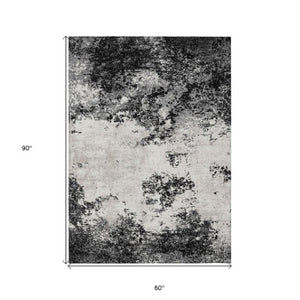 Homeroots 3' Black Gray And Ivory Abstract Washable Area Rug For Indoor And Outdoor Use - Durable Design 5' X 8' Polyester 599461