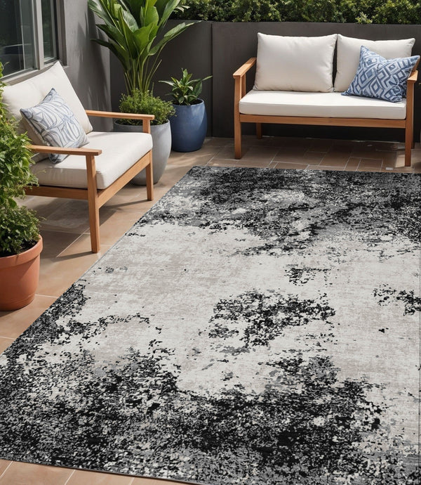 Homeroots 3' Black Gray And Ivory Abstract Washable Area Rug For Indoor And Outdoor Use - Durable Design 5' X 8' Polyester 599461