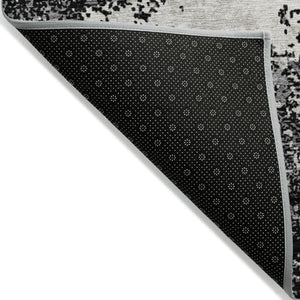 Homeroots 3' Black Gray And Ivory Abstract Washable Area Rug For Indoor And Outdoor Use - Durable Design 5' X 8' Polyester 599461