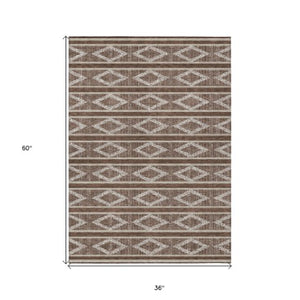 Homeroots 3' Black And Beige Geometric Indoor Outdoor Area Rug - Stylish, Durable, Washable For Any Space 3' X 5' Polyester 599610