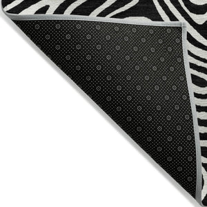 HomeRoots 5' Black and Ivory Abstract Area Rug – Stylish, Washable, Stain-Resistant for Indoor and Outdoor Use 5' X 8' 599689