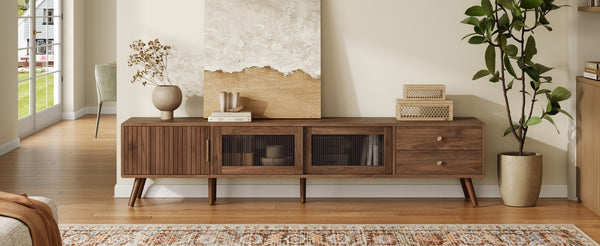 English Elm 76" Modern Minimal TV Stand with Waveform Glass Doors, Soft-Close Drawers, Cable Management, Solid Wood Legs (Fits TVs up to 85") N710P298234P