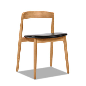 English Elm Jennifer Taylor Home - Raven Solid Oak Stacking Sculpted Dining Chair – Mid-Century Natural Finish, Black Faux Leather Comfort (Stackable) B2719P238276